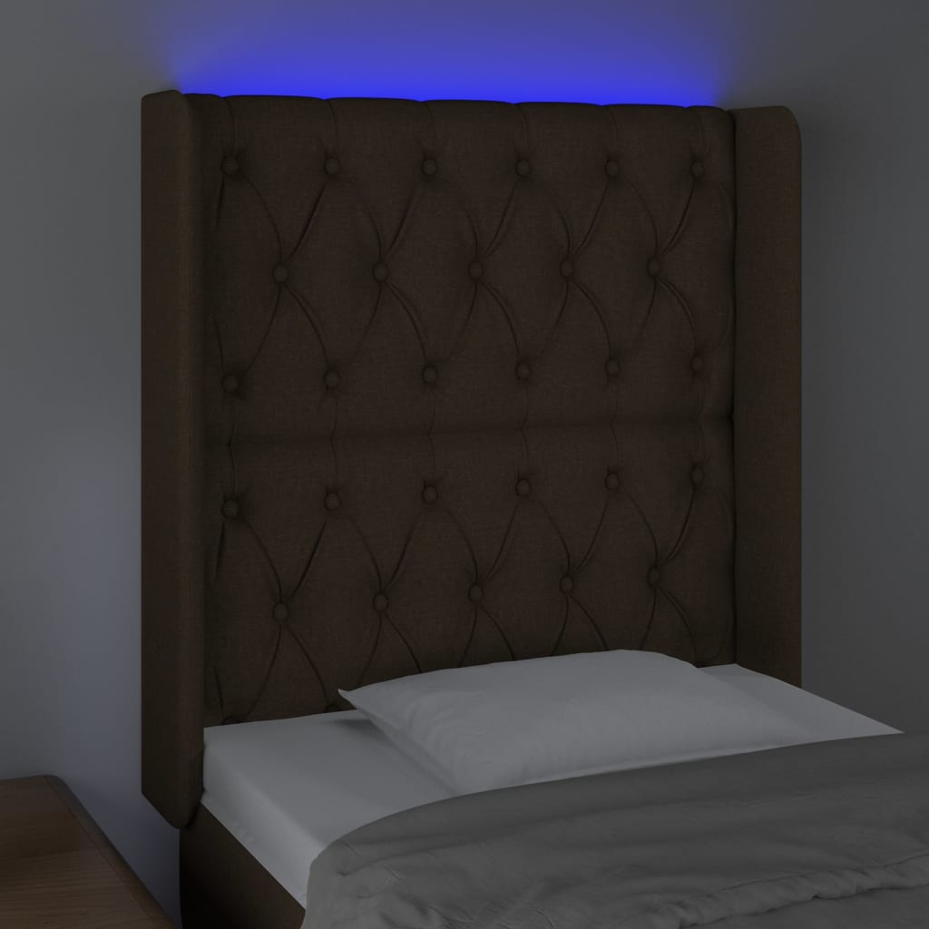 sengegavl med LED-lys 83x16x118/128 cm stof mørkebrun