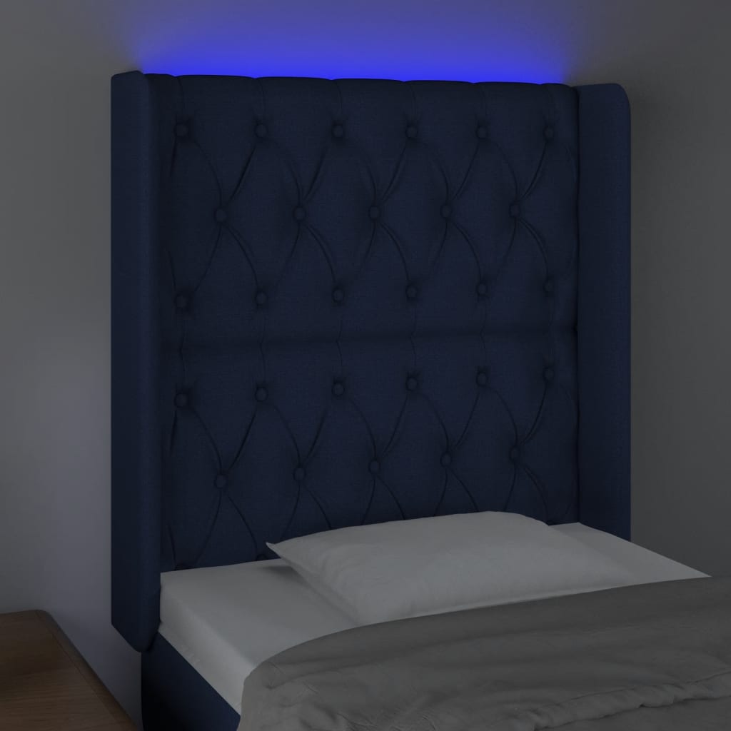 sengegavl med LED-lys 83x16x118/128 cm stof blå