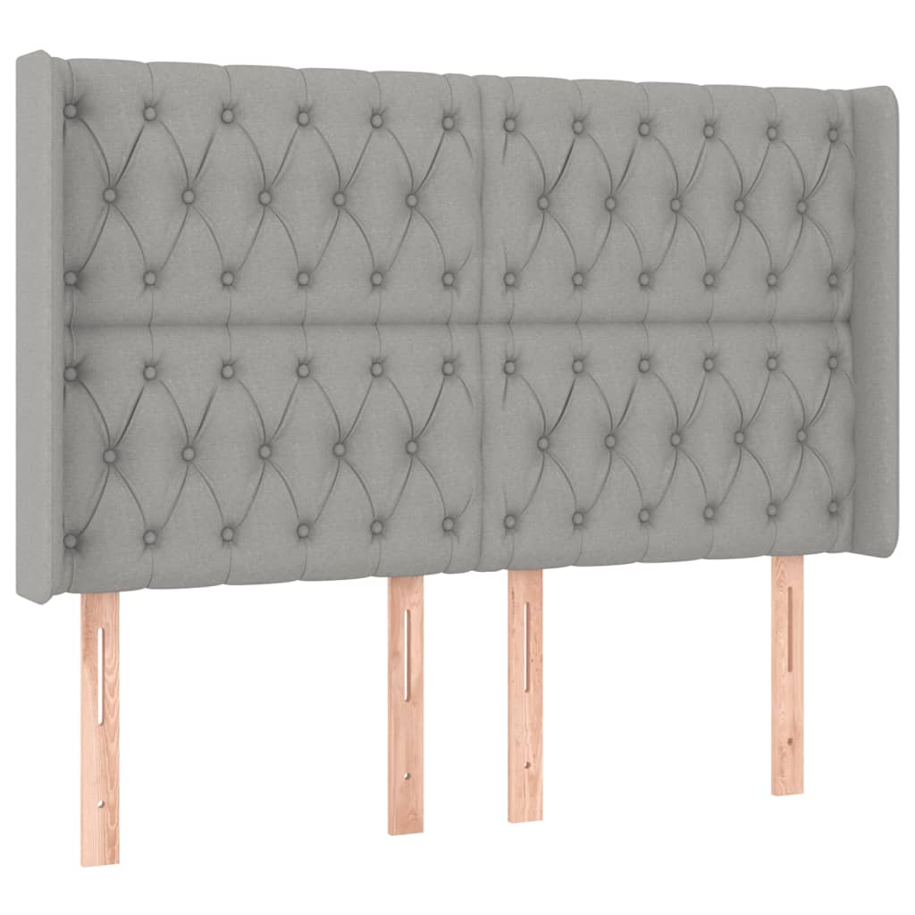 sengegavl med LED-lys 147x16x118/128 cm stof lysegrå