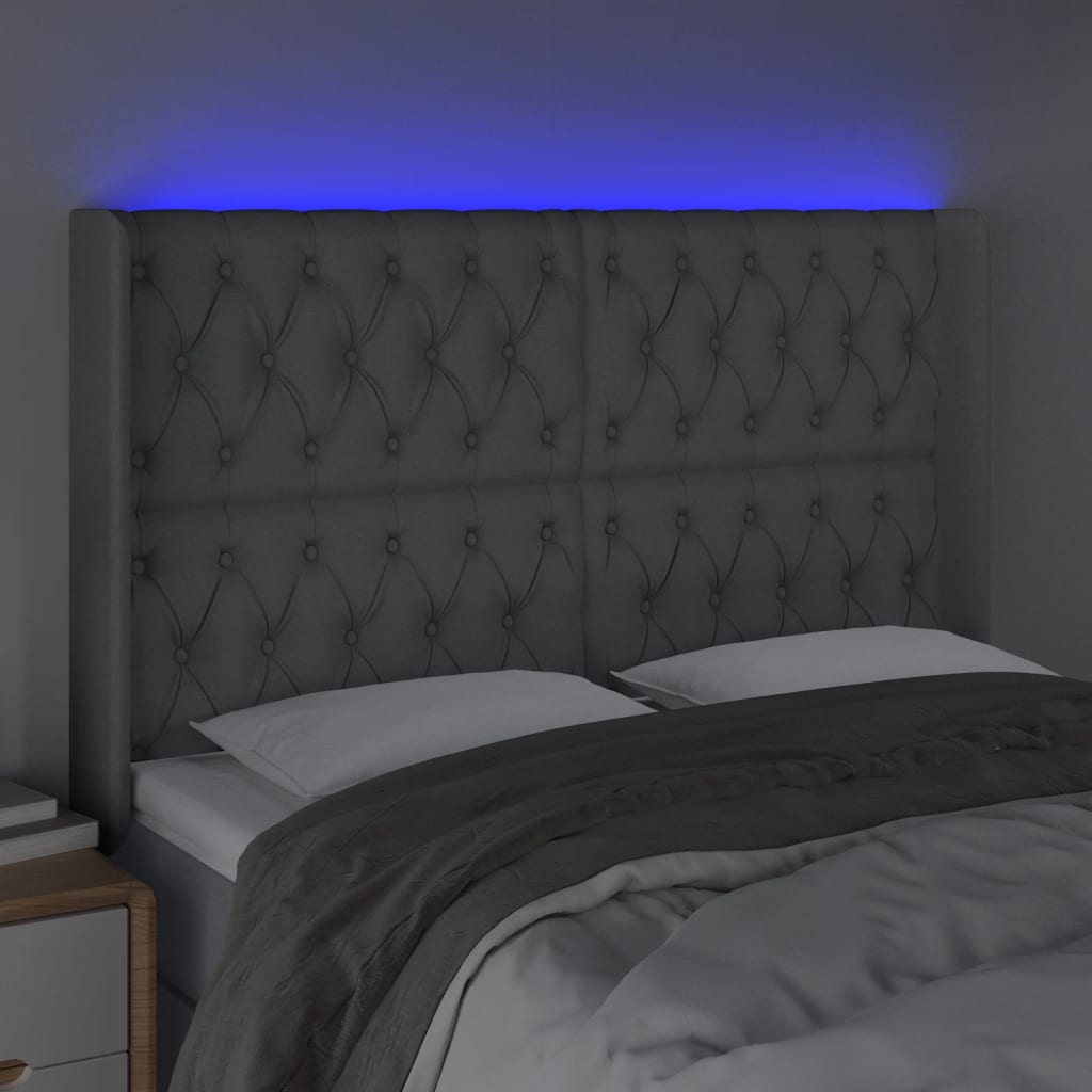 sengegavl med LED-lys 147x16x118/128 cm stof lysegrå