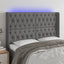 sengegavl med LED-lys 147x16x118/128 cm stof mørkegrå