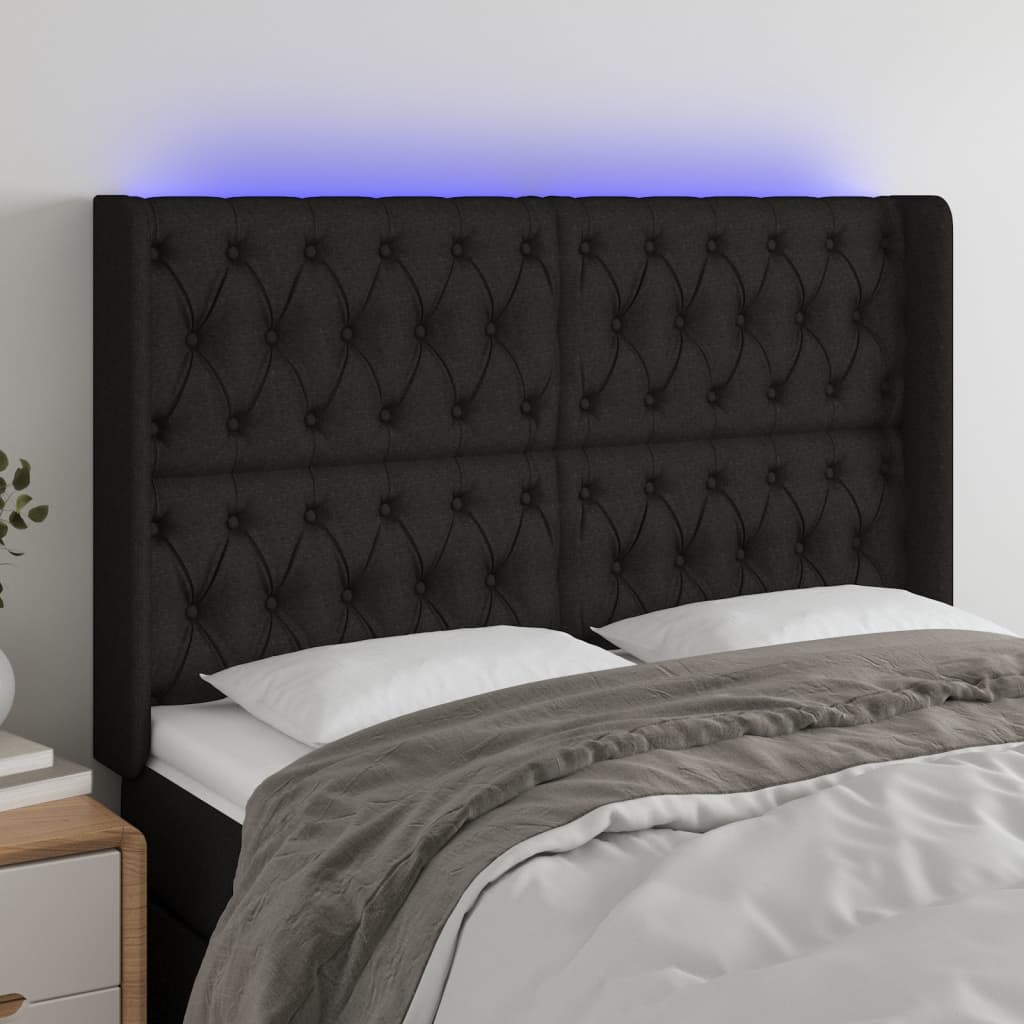 sengegavl med LED-lys 147x16x118/128 cm stof sort