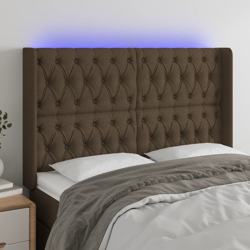 sengegavl med LED-lys 147x16x118/128 cm stof mørkebrun