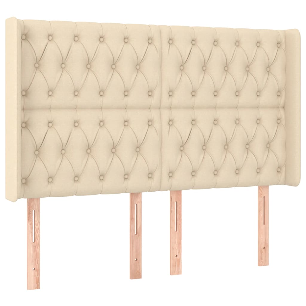sengegavl med LED-lys 147x16x118/128 cm stof cremefarvet