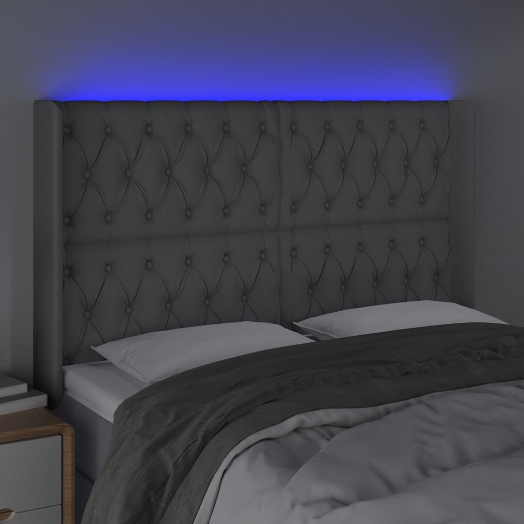 sengegavl med LED-lys 163x16x118/128 cm stof lysegrå