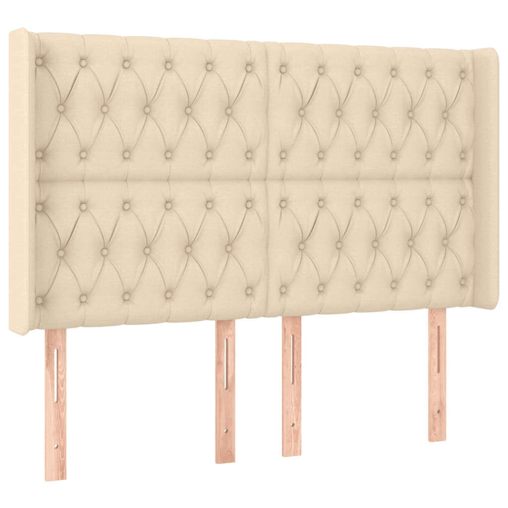 sengegavl med LED-lys 163x16x118/128 cm stof cremefarvet