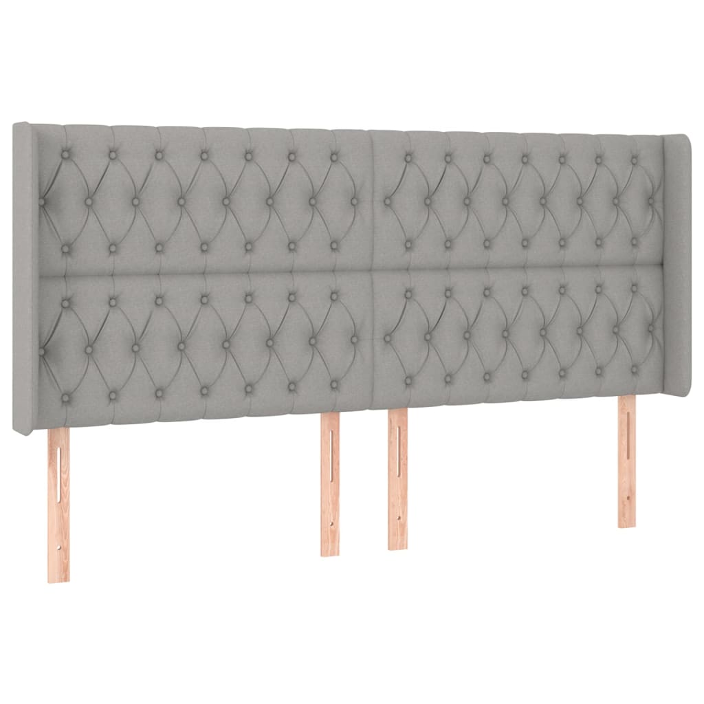 sengegavl med LED-lys 203x16x118/128 cm stof lysegrå
