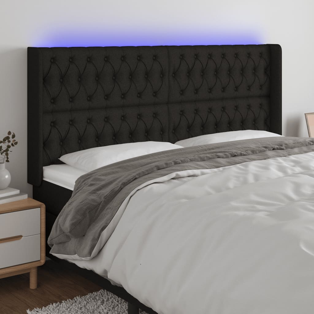 sengegavl med LED-lys 203x16x118/128 cm stof sort