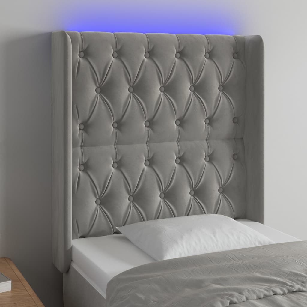 sengegavl med LED-lys 83x16x118/128 cm fløjl lysegrå