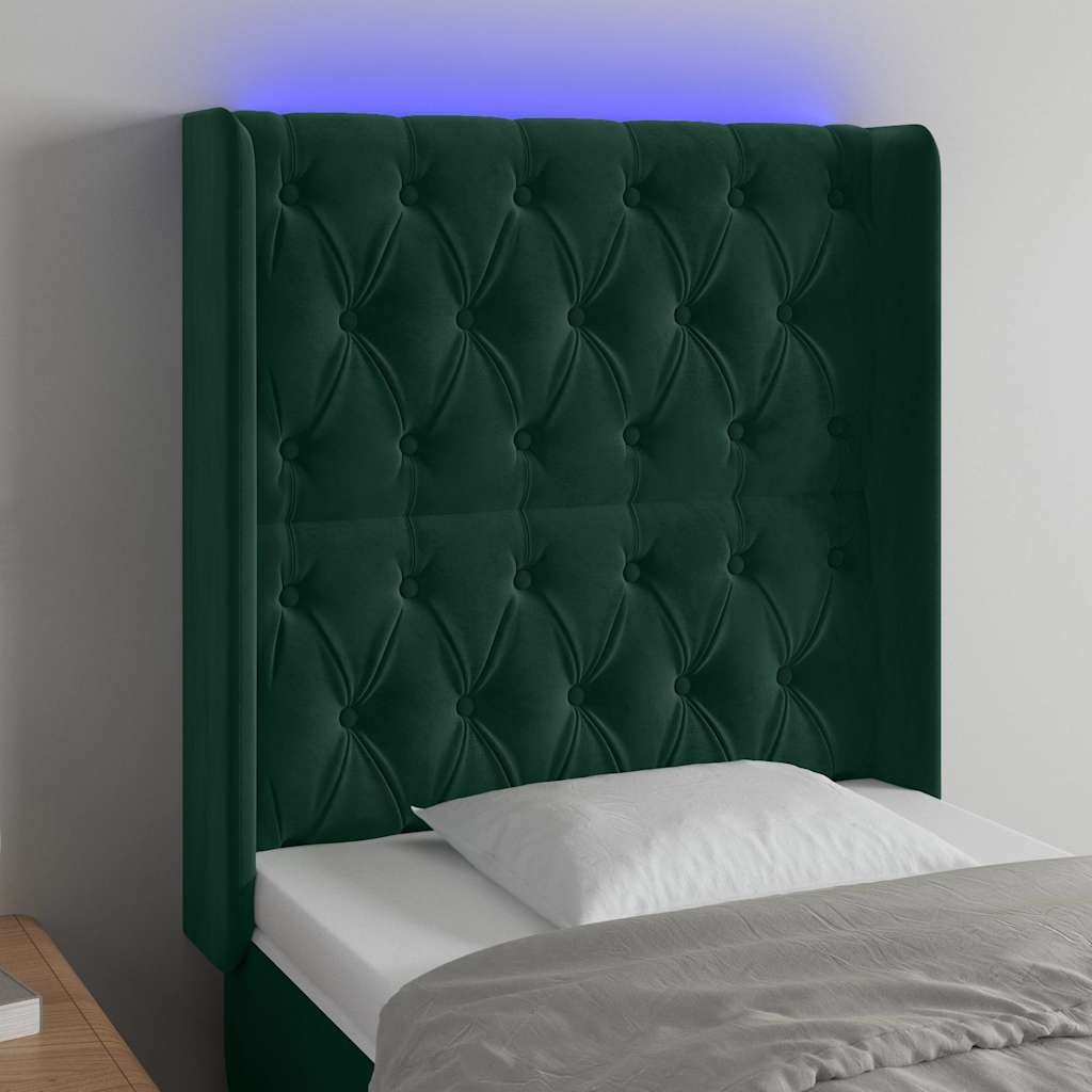 sengegavl med LED-lys 83x16x118/128 cm fløjl mørkegrøn
