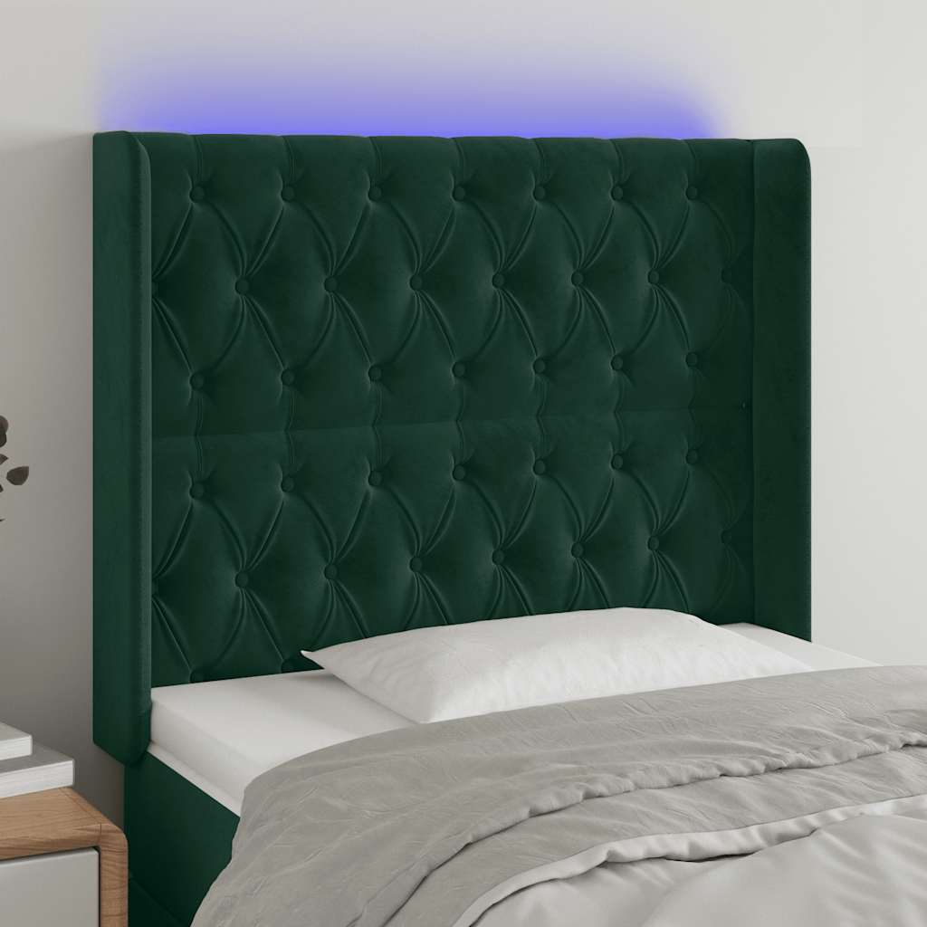 sengegavl med LED-lys 103x16x118/128 cm fløjl mørkegrøn