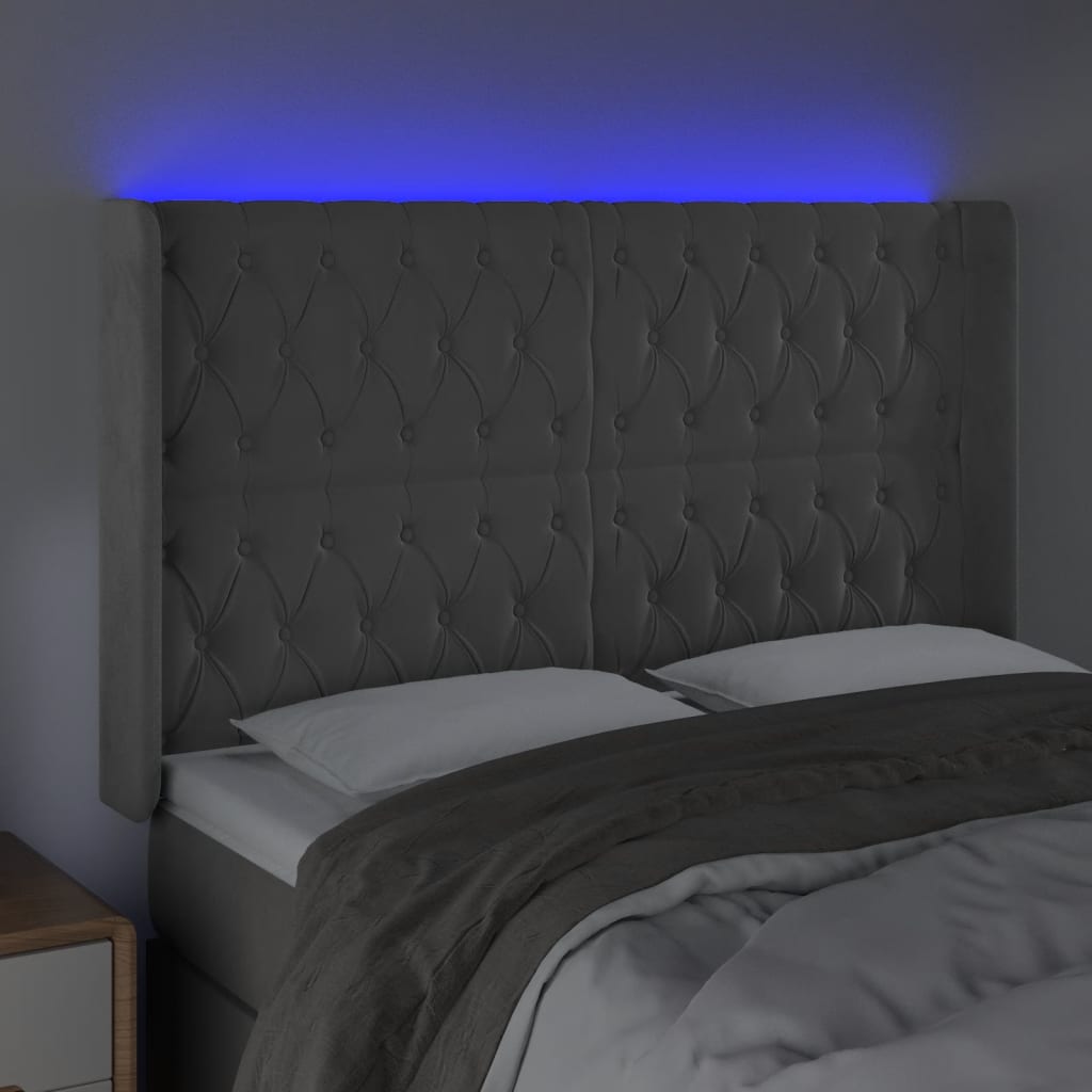 sengegavl med LED-lys 147x16x118/128 cm fløjl lysegrå