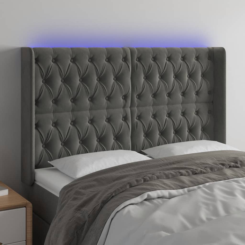 sengegavl med LED-lys 147x16x118/128 cm fløjl mørkegrå