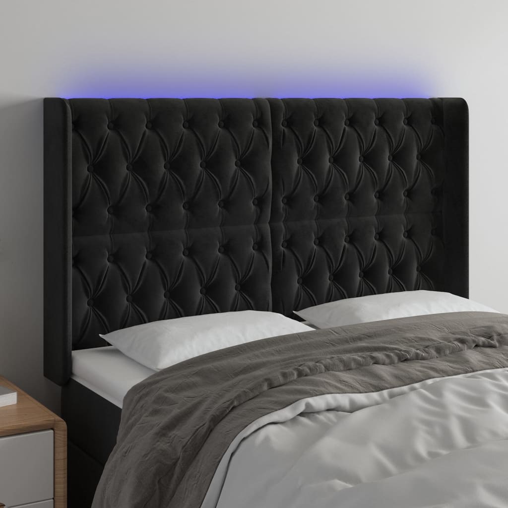 sengegavl med LED-lys 147x16x118/128 cm fløjl sort