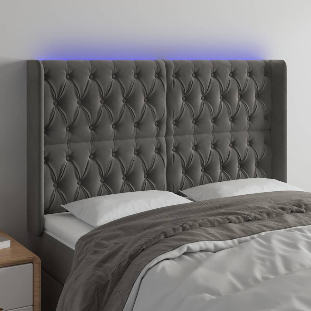 sengegavl med LED-lys 163x16x118/128 cm fløjl mørkegrå