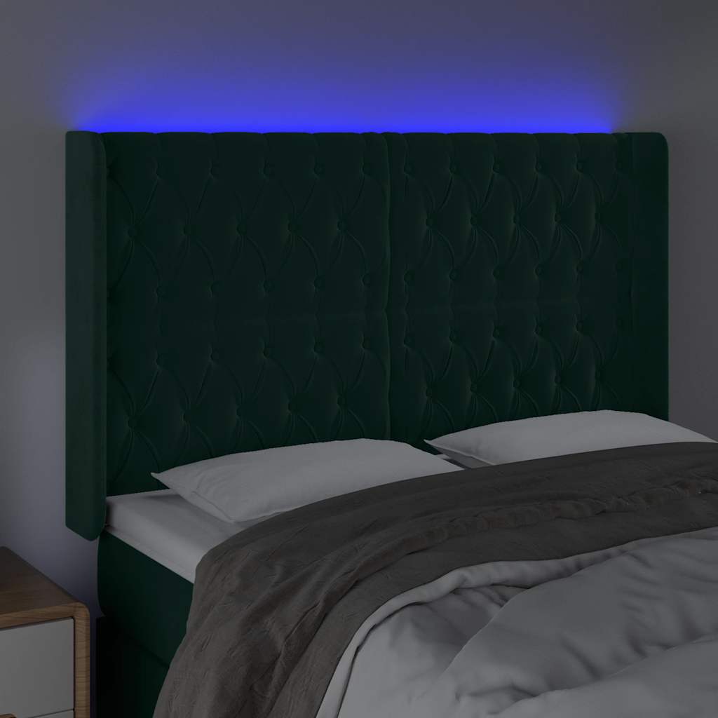 sengegavl med LED-lys 163x16x118/128 cm fløjl mørkegrøn