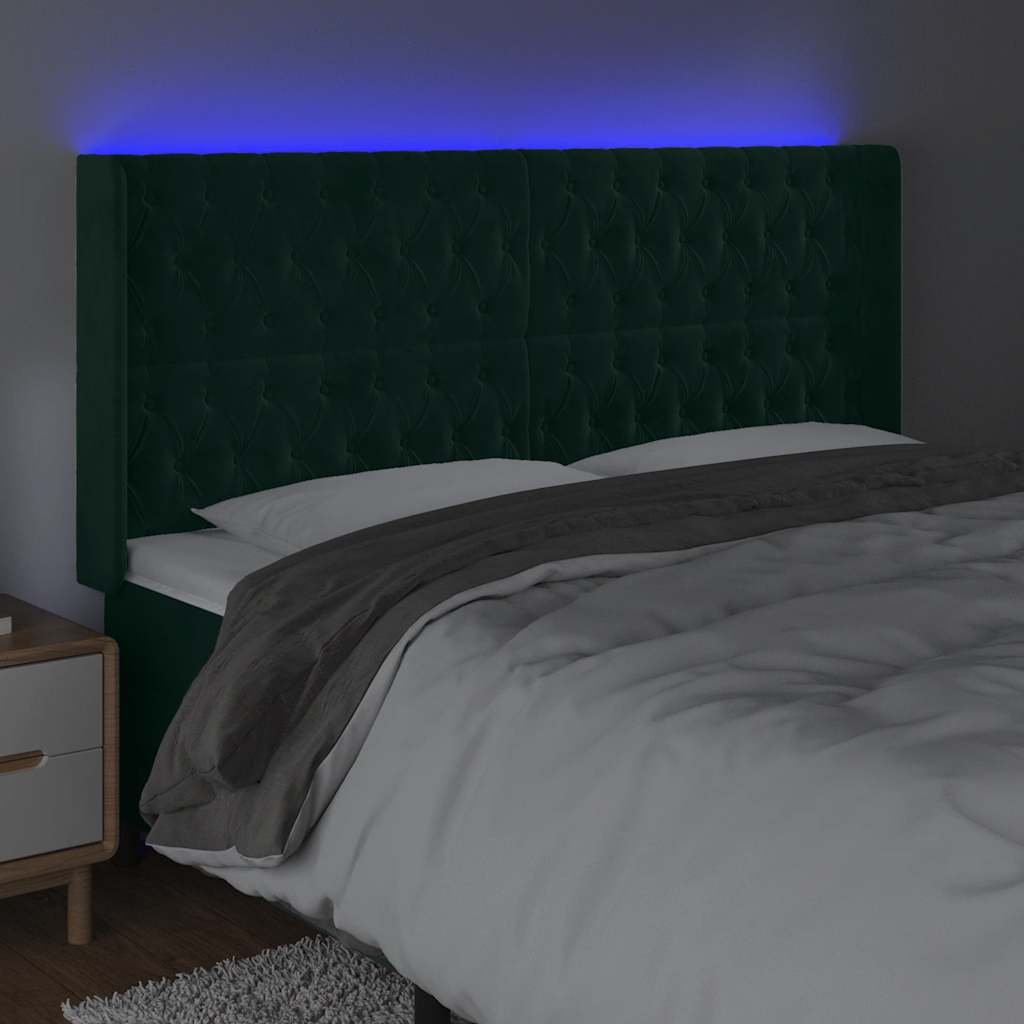 sengegavl med LED-lys 183x16x118/128 cm fløjl mørkegrøn