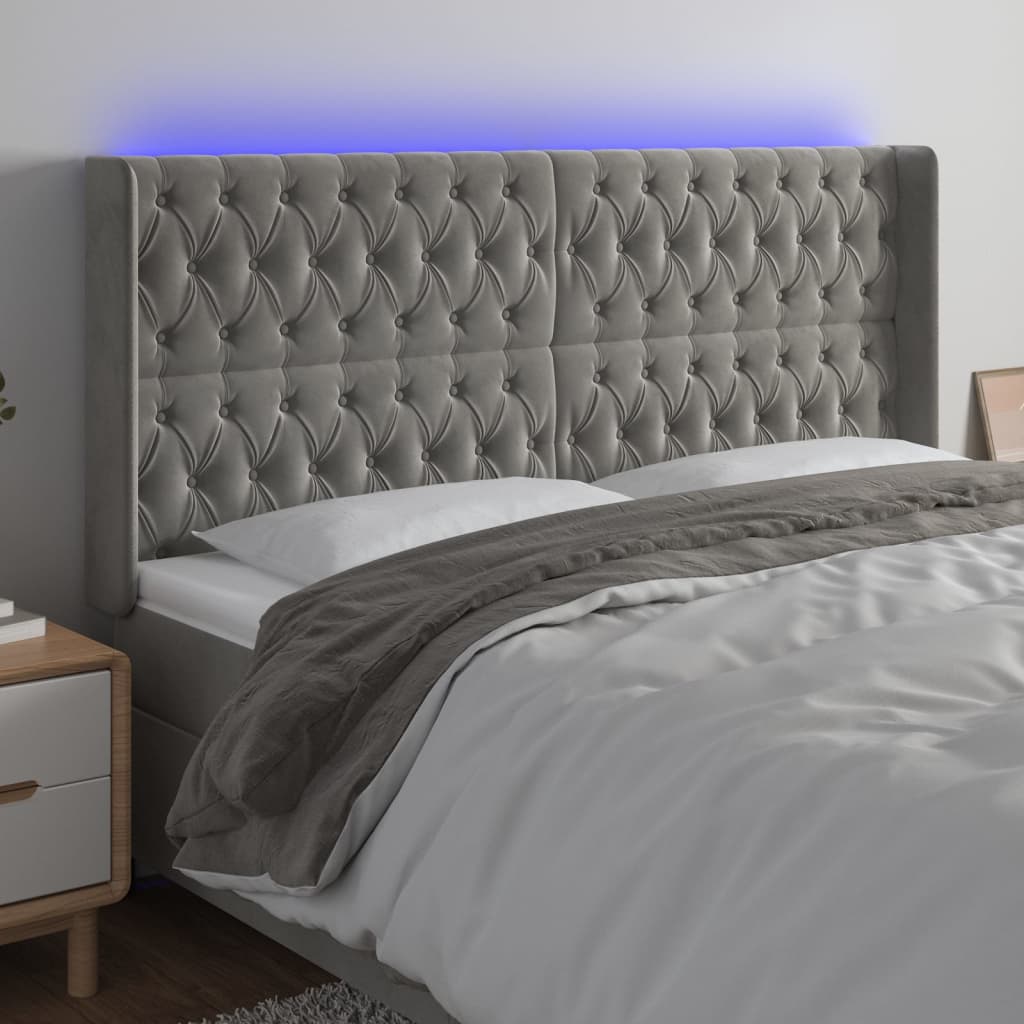 sengegavl med LED-lys 203x16x118/128 cm fløjl lysegrå