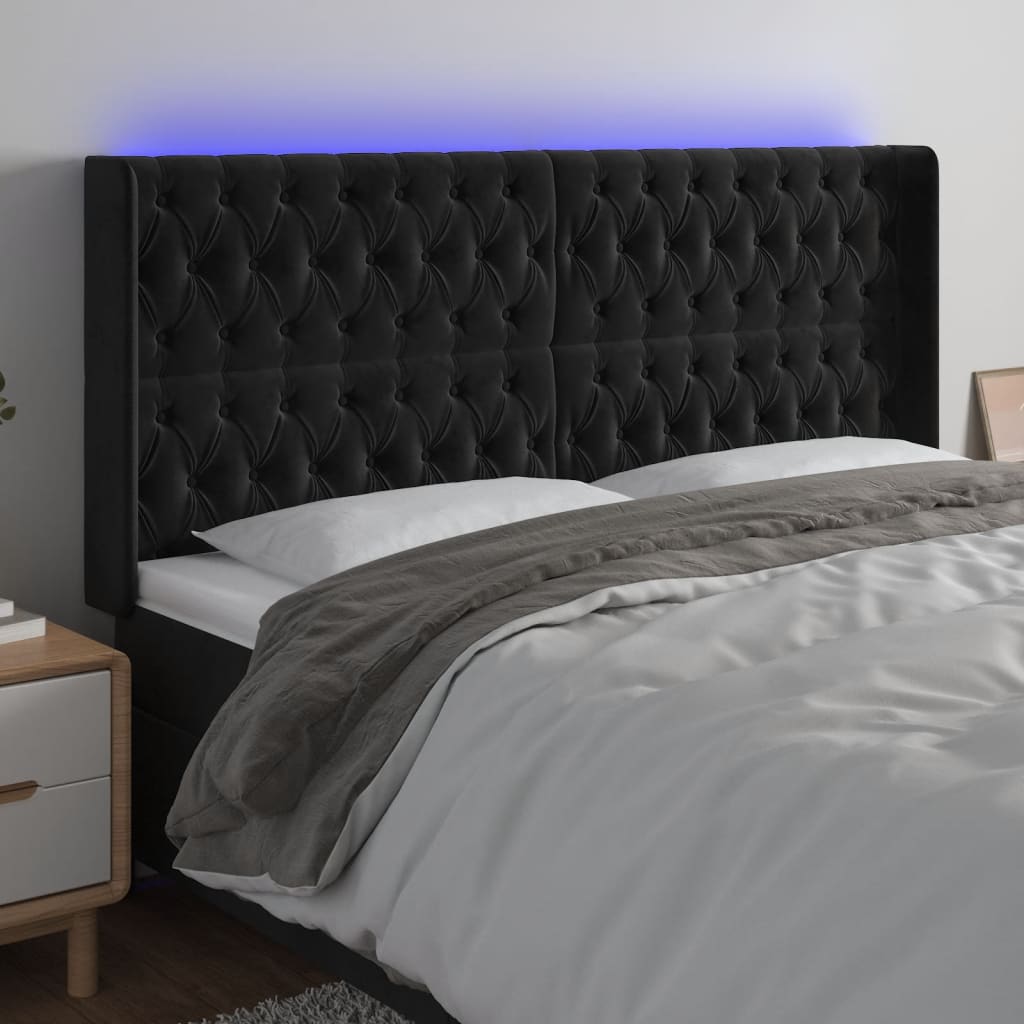 sengegavl med LED-lys 203x16x118/128 cm fløjl sort