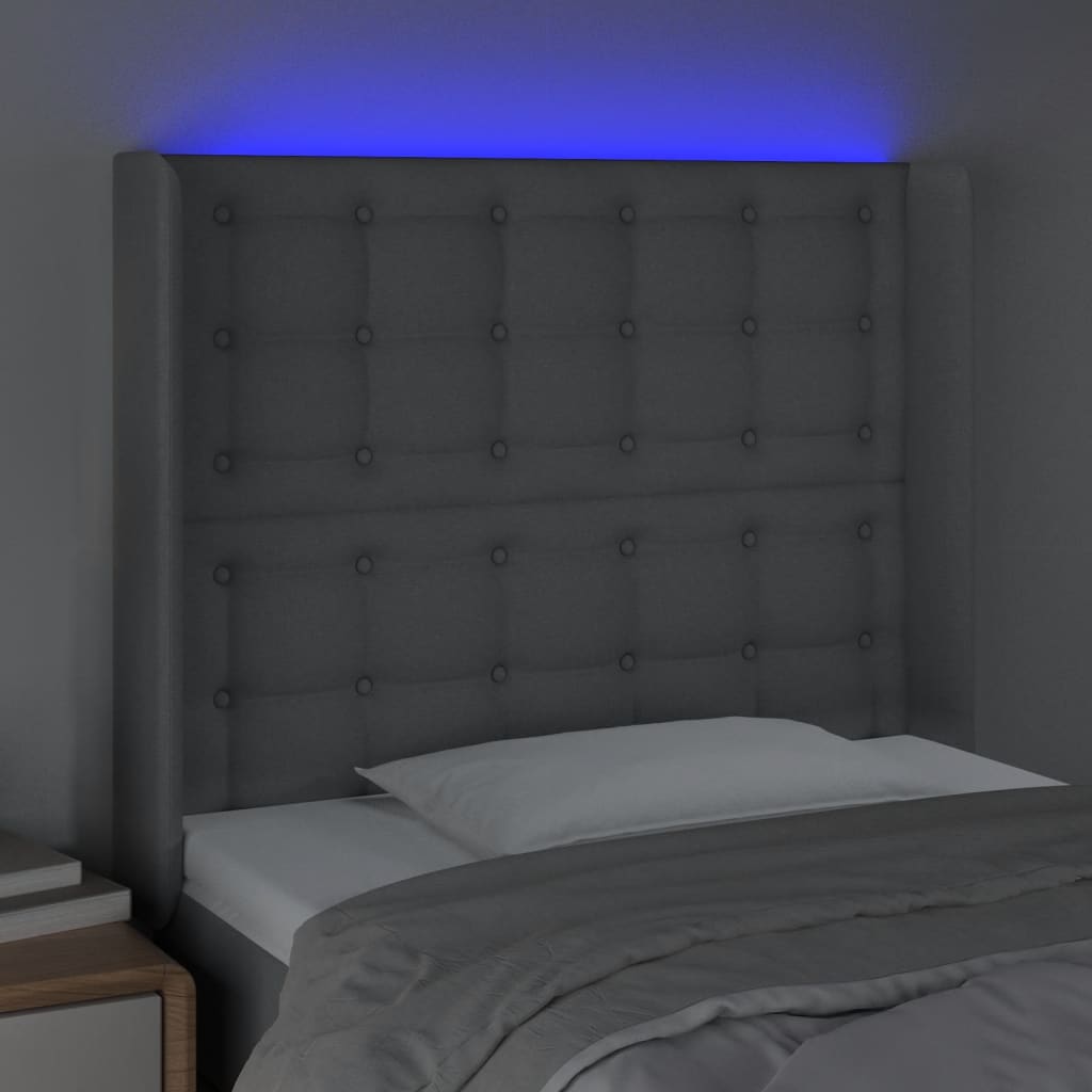 sengegavl med LED-lys 103x16x118/128 cm stof lysegrå