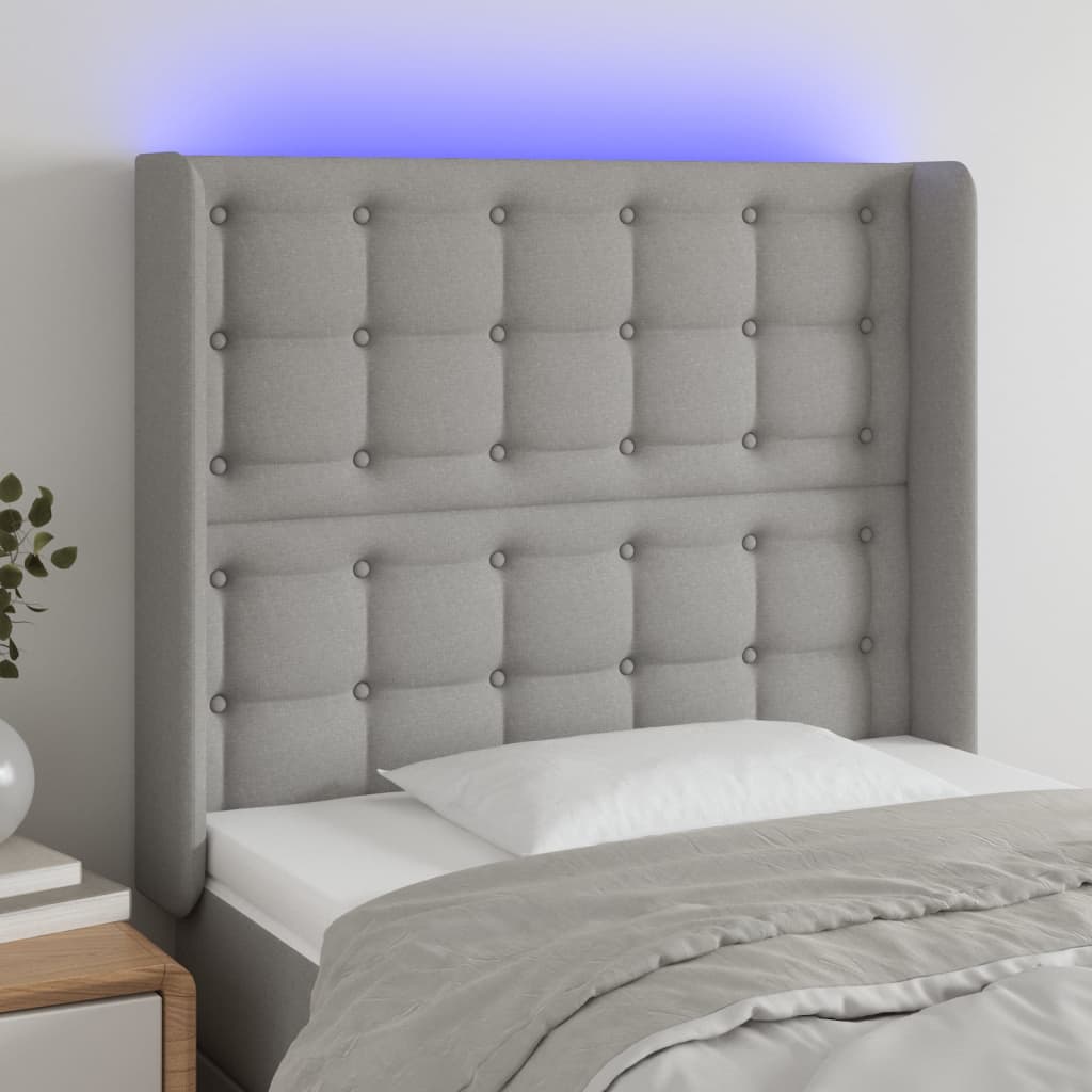 sengegavl med LED-lys 103x16x118/128 cm stof lysegrå