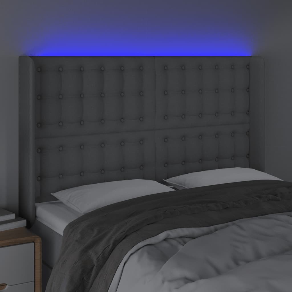 sengegavl med LED-lys 147x16x118/128 cm stof lysegrå