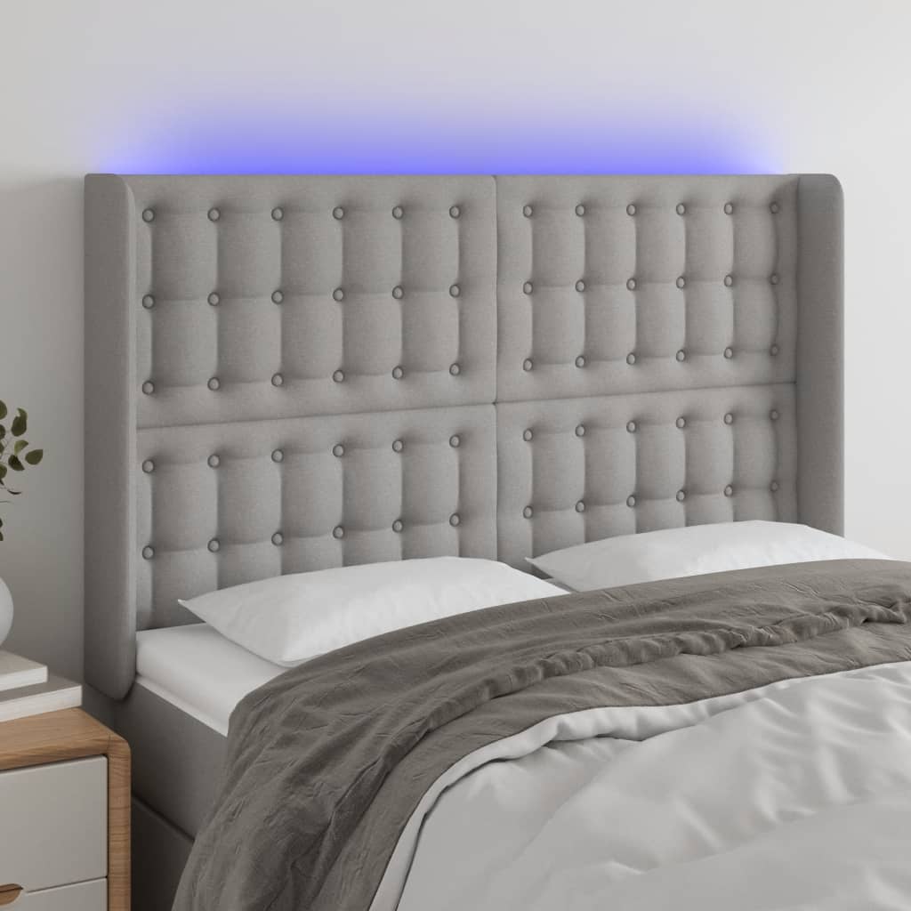 sengegavl med LED-lys 147x16x118/128 cm stof lysegrå