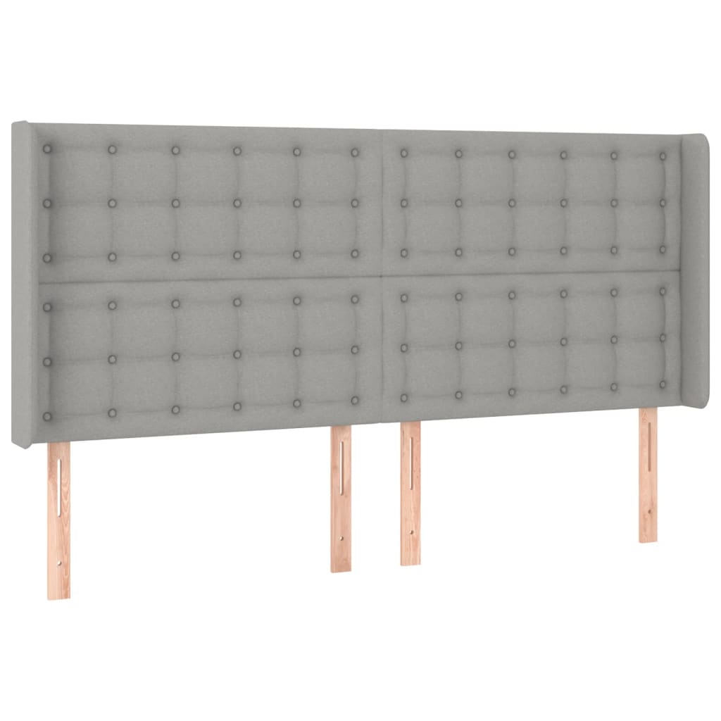 sengegavl med LED-lys 163x16x118/128 cm stof lysegrå