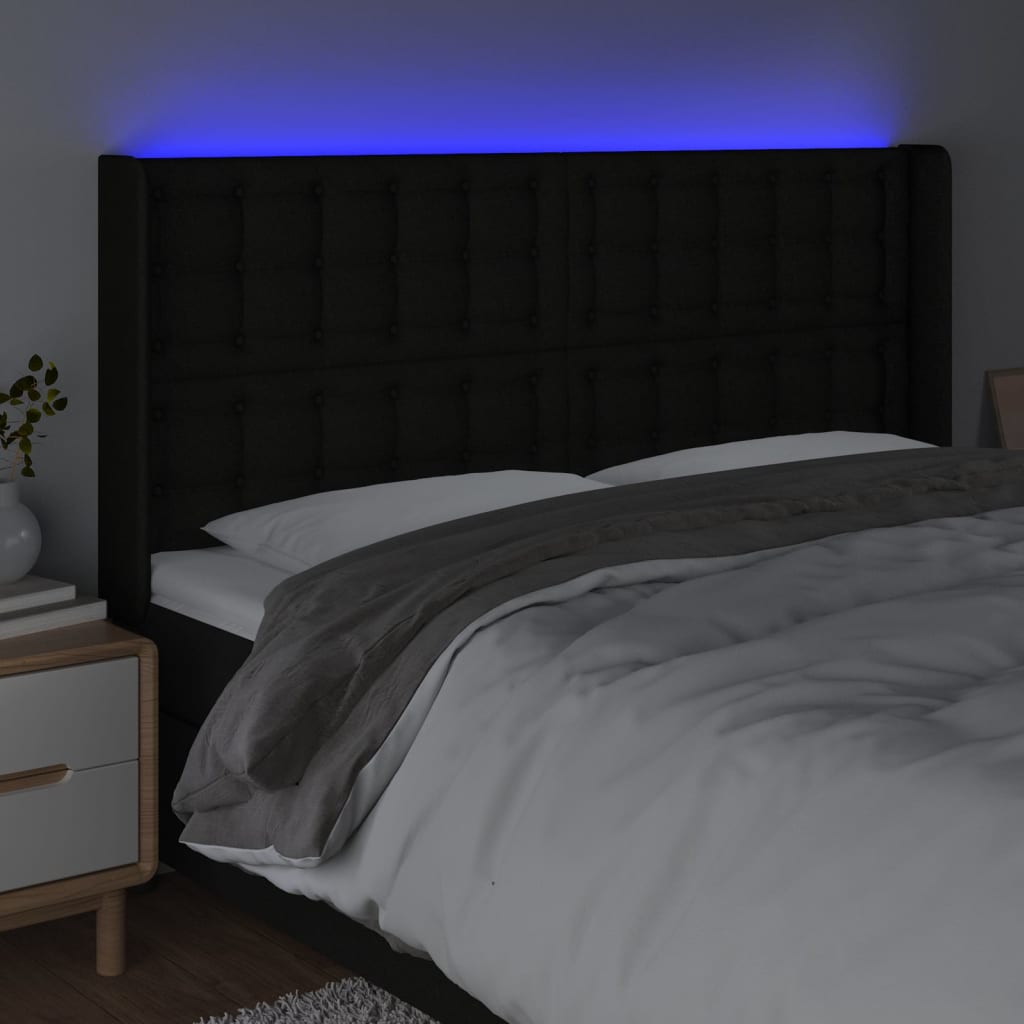 sengegavl med LED-lys 163x16x118/128 cm stof sort