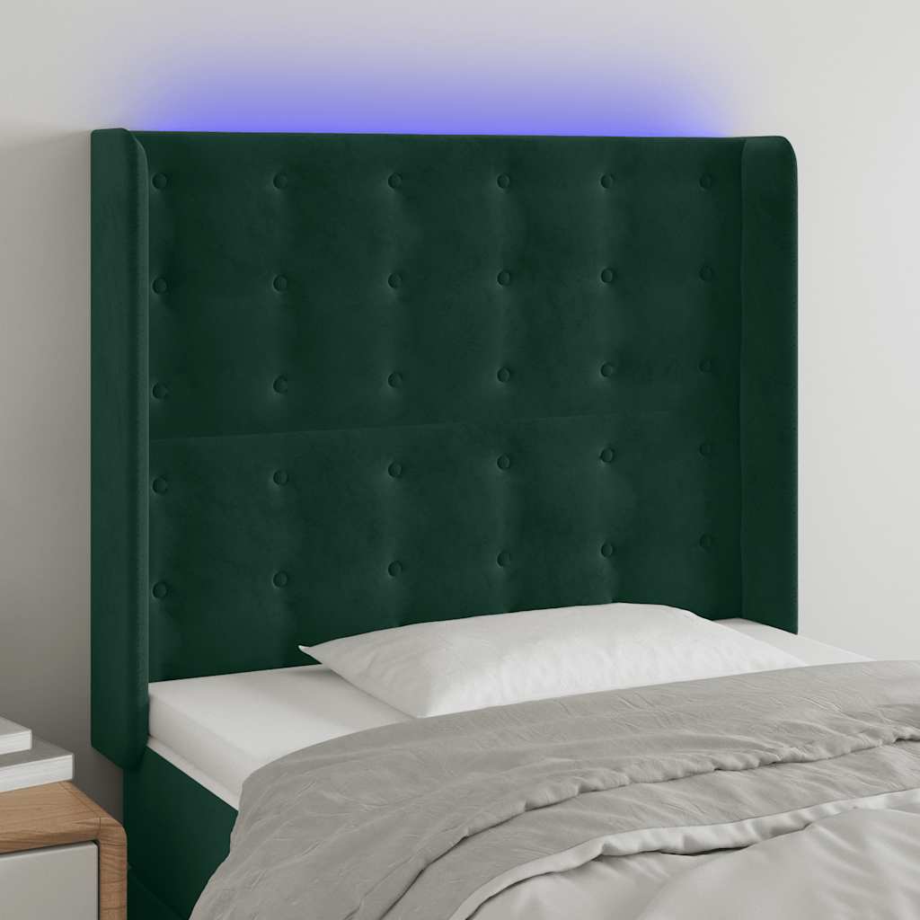 sengegavl med LED-lys 93x16x118/128 cm fløjl mørkegrøn