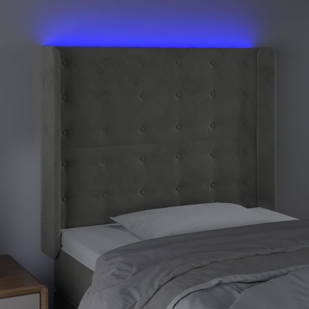 sengegavl med LED-lys 103x16x118/128 cm fløjl lysegrå