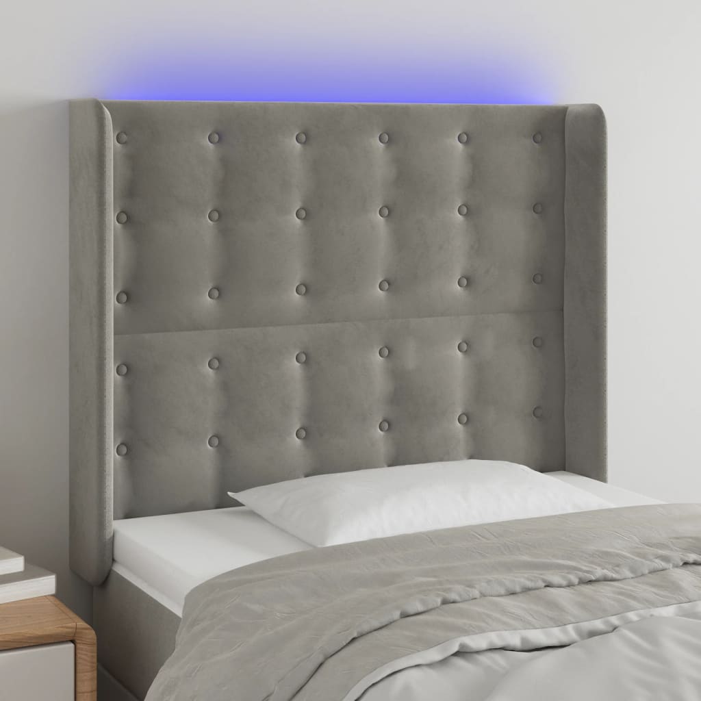 sengegavl med LED-lys 103x16x118/128 cm fløjl lysegrå