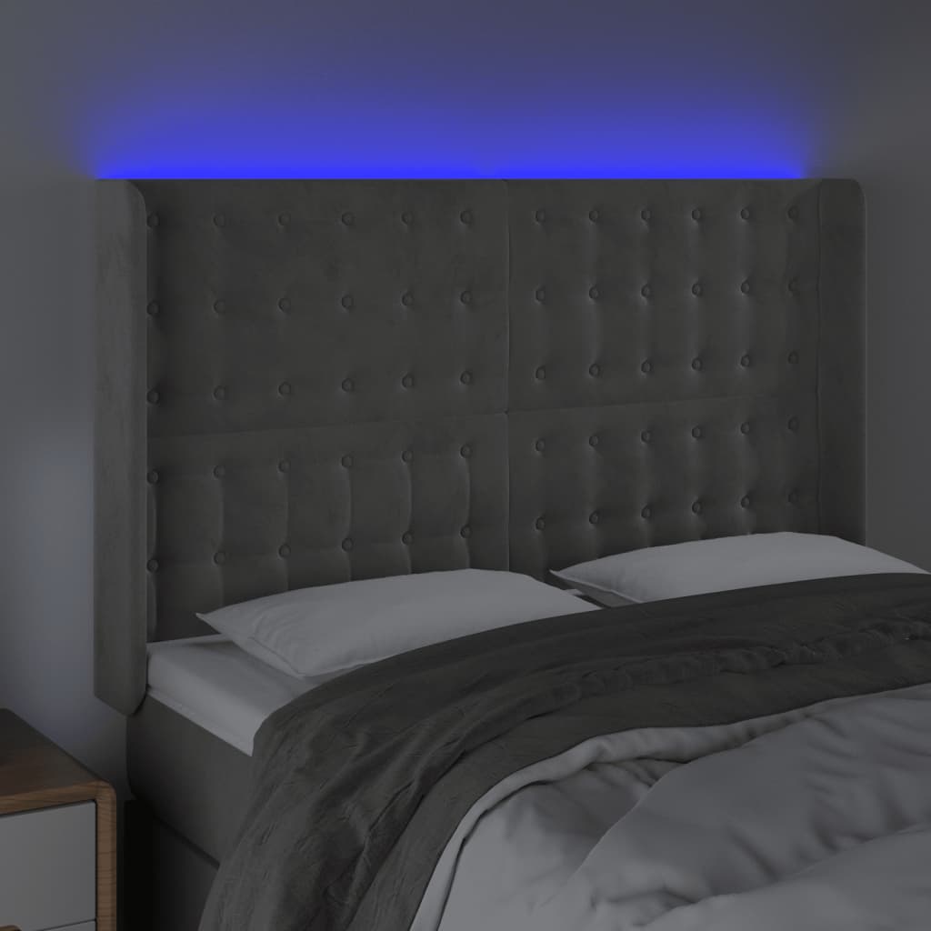 sengegavl med LED-lys 147x16x118/128 cm fløjl lysegrå