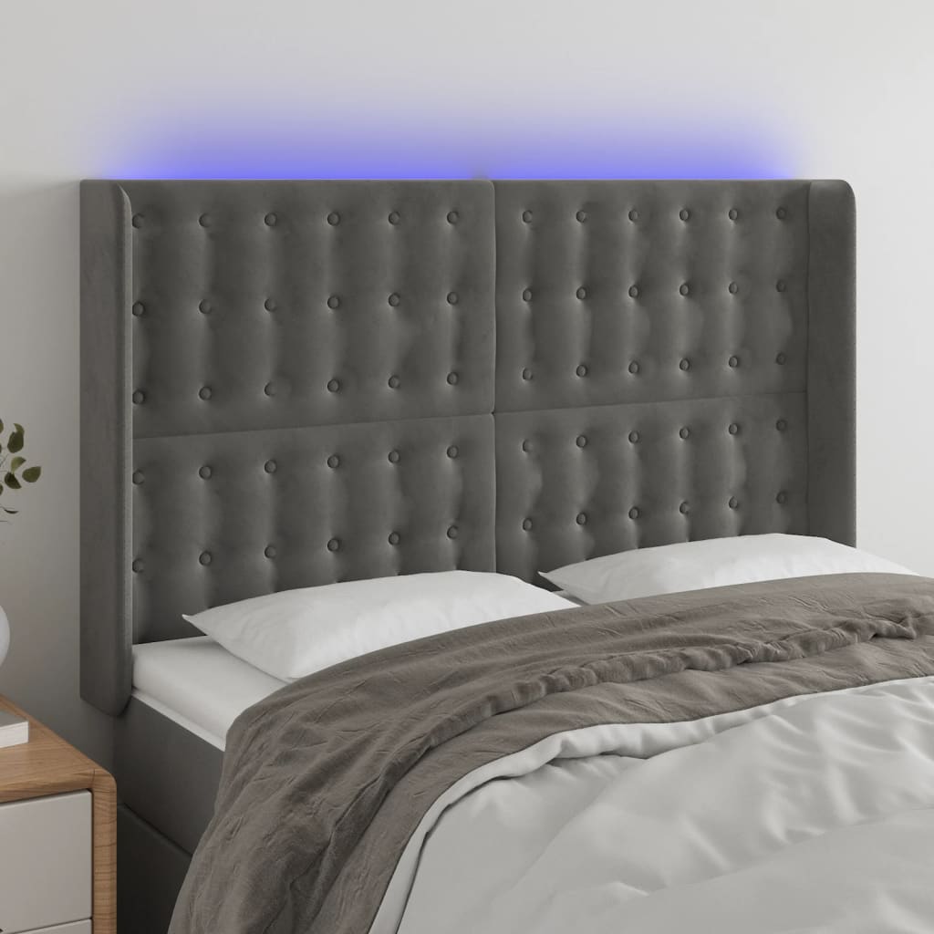 sengegavl med LED-lys 147x16x118/128 cm fløjl mørkegrå