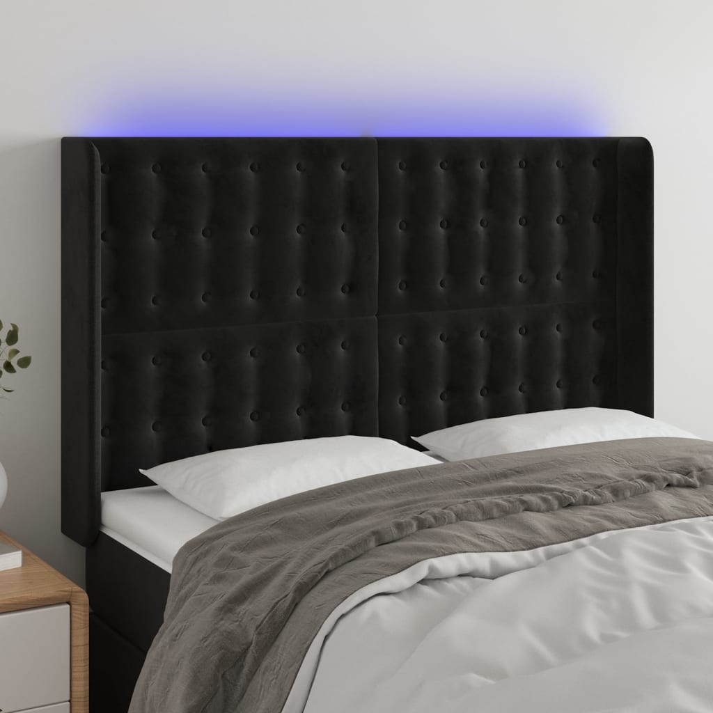 sengegavl med LED-lys 147x16x118/128 cm fløjl sort