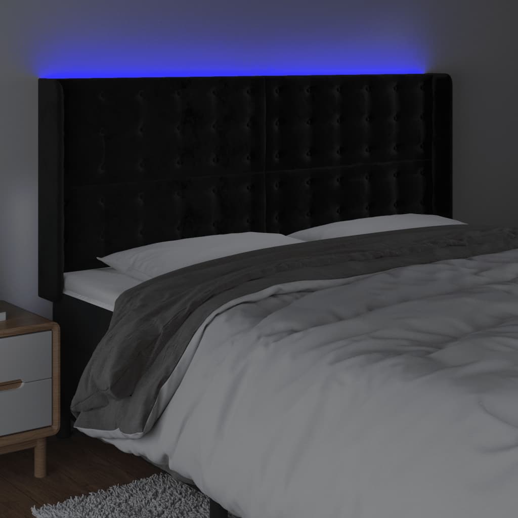 sengegavl med LED-lys 203x16x118/128 cm fløjl sort