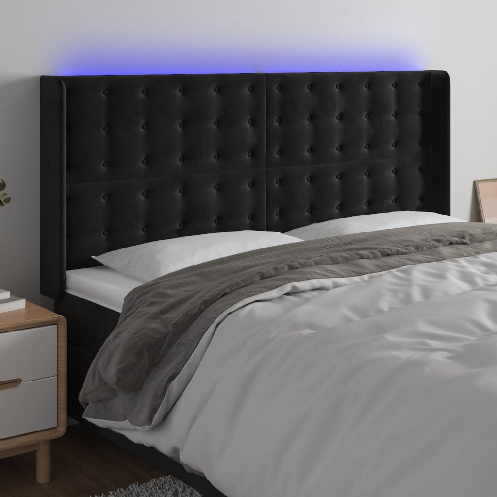 sengegavl med LED-lys 203x16x118/128 cm fløjl sort