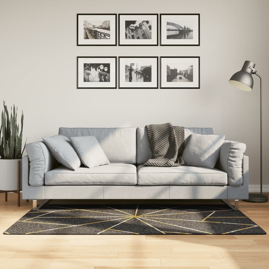 gulvtæppe 80x150 cm vaskbart sort + guldfarvet