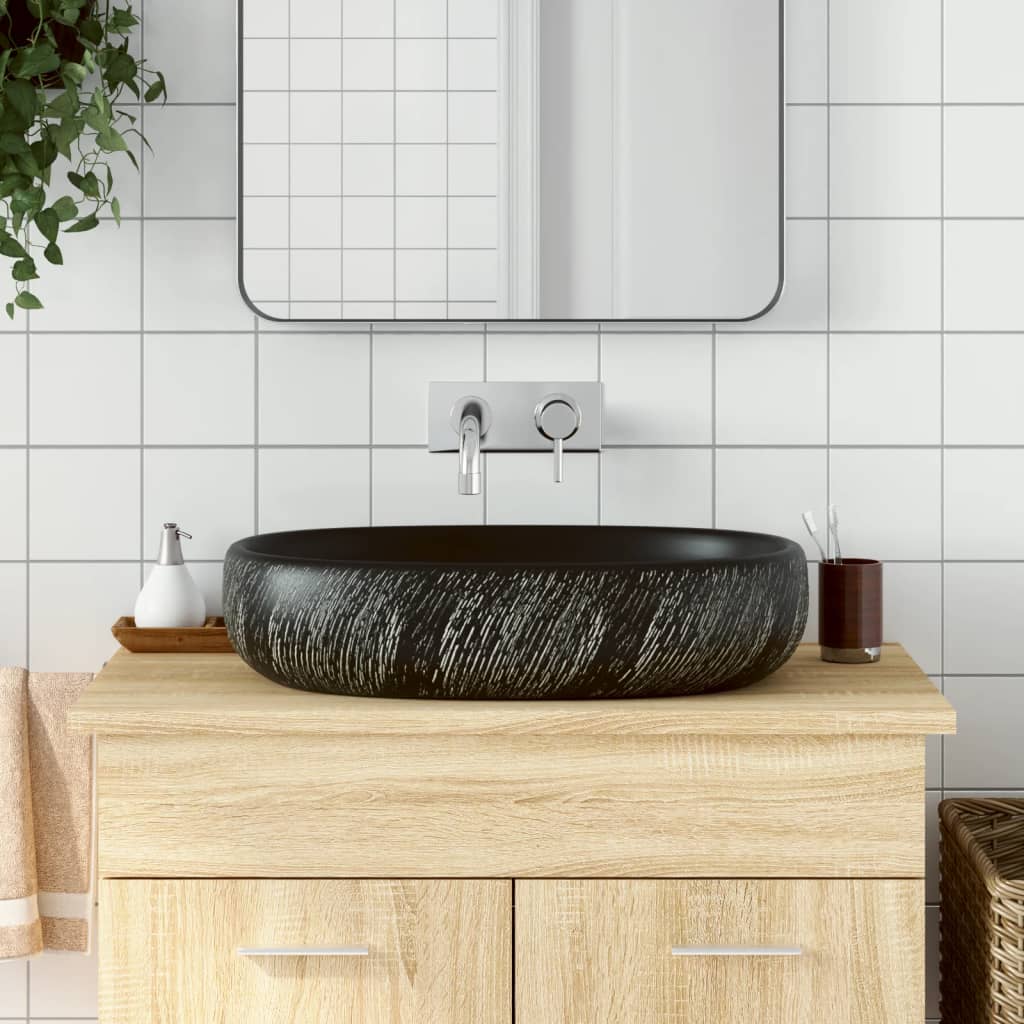 håndvask til bordplade 59x40x14 cm oval keramik sort