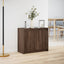skab med LED-lys 72x34x61 cm konstrueret træ brun egetræsfarve