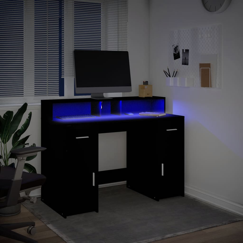 skrivebord med LED-lys 120x55x91 cm konstrueret træ sort