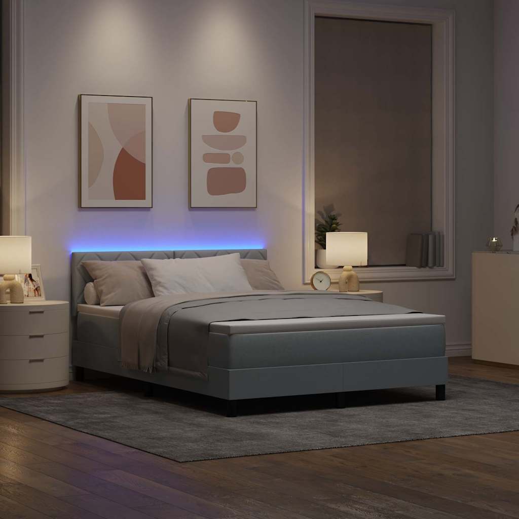 Box spring seng med LED-lysstrimler Lysegrå 140 x 190 cm Stof