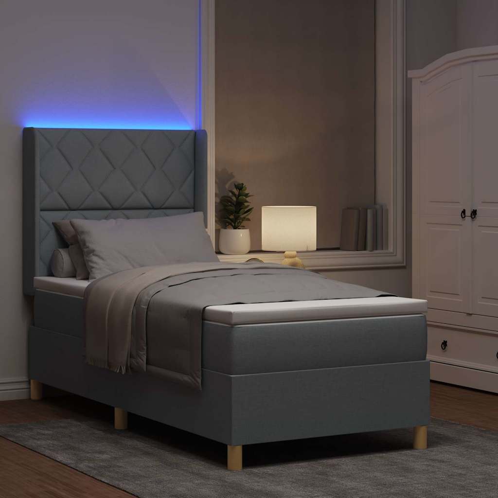 Box spring seng med LED-lysstrimler Lysegrå 90 x 190 cm Stof