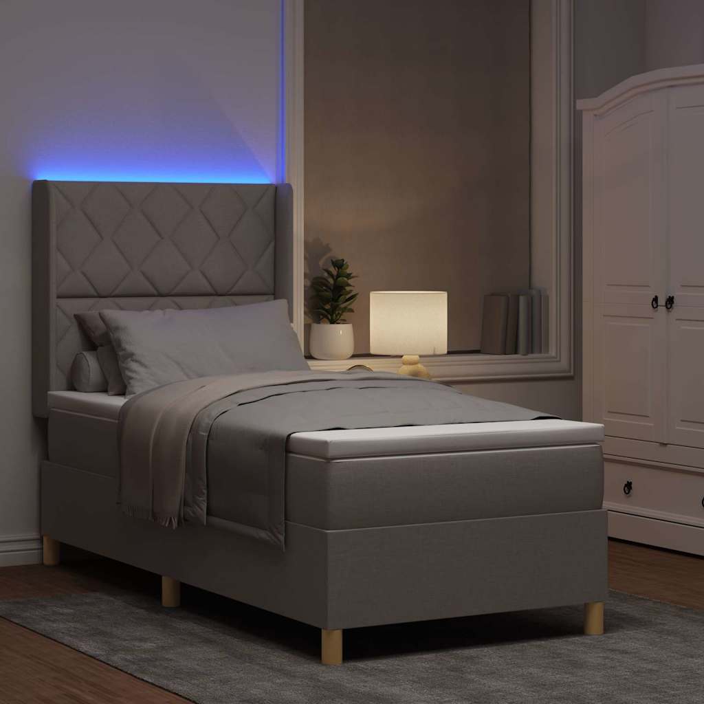 Box spring seng med LED-lysstrimler Gråbrun 100 x 200 cm Stof