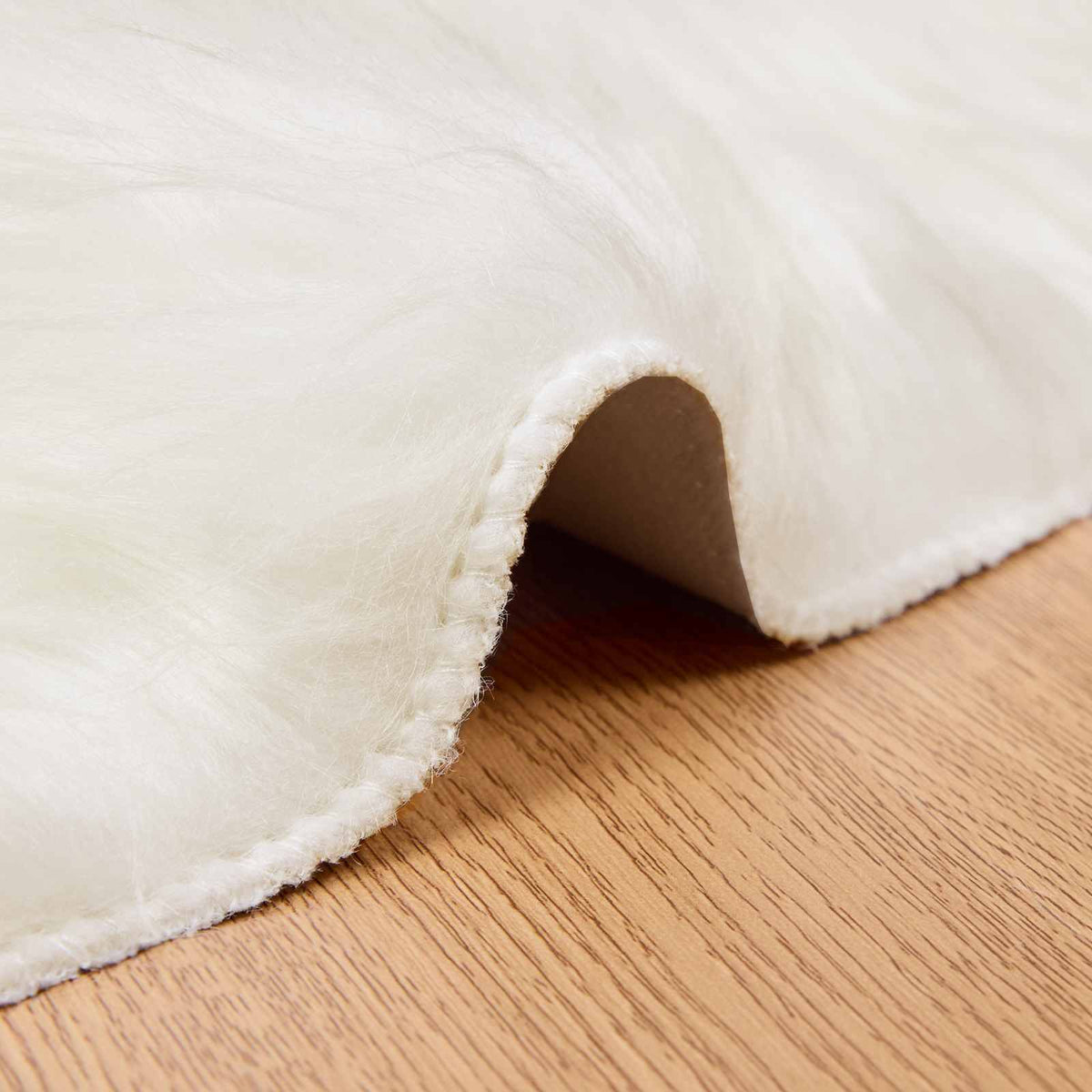 Fuskobbel lammeskindstæppe TAFALLA Hvid Ø 100 cm Polyester