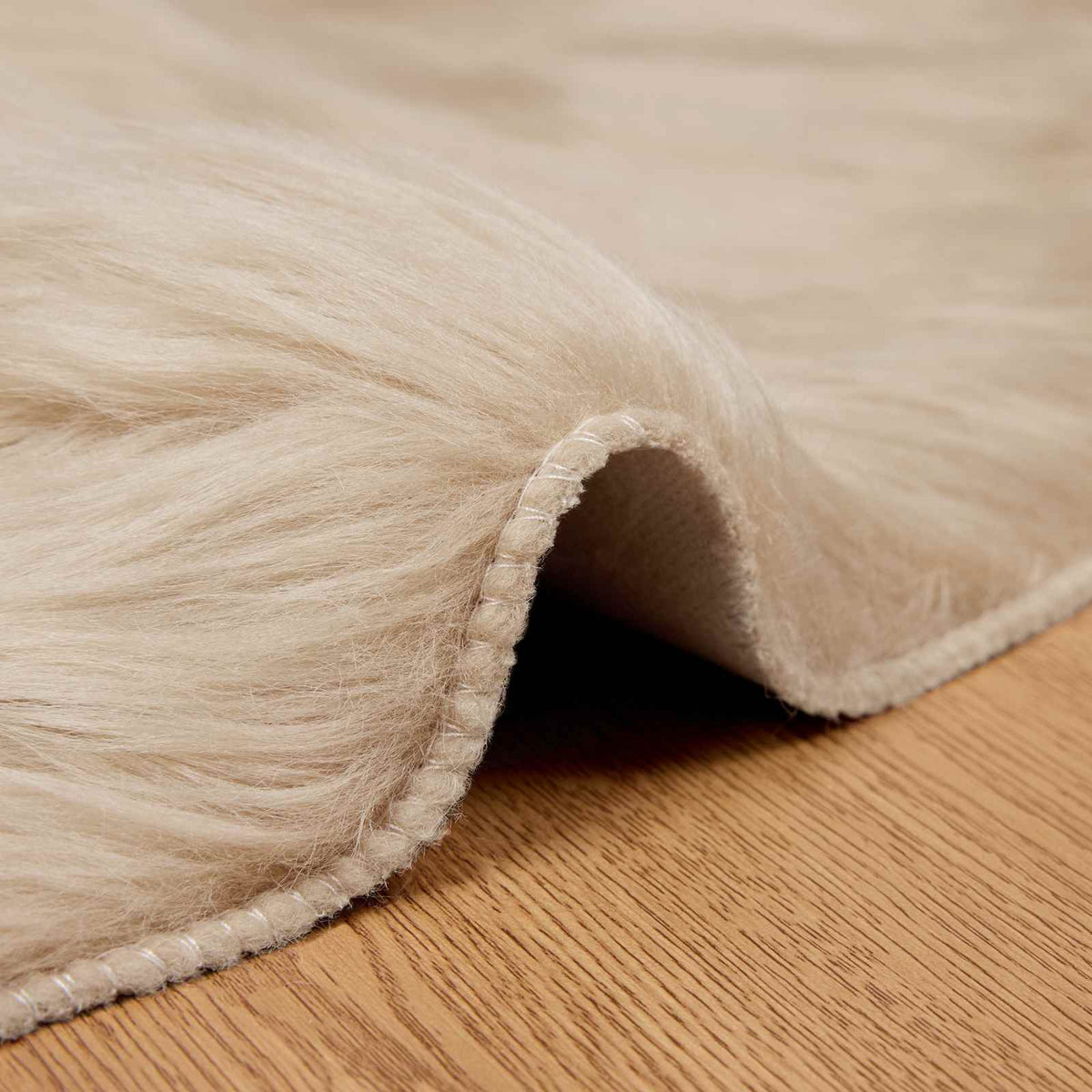 Fuskobbel lammeskindstæppe TAFALLA Beige Ø 80 cm Polyester