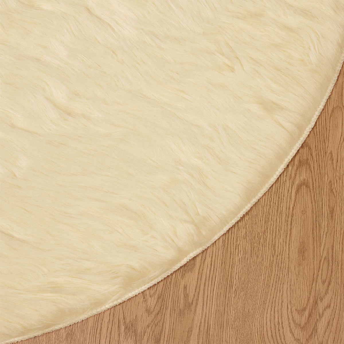 Fuskobbel lammeskindstæppe TAFALLA Cremefarvet Ø 200 cm