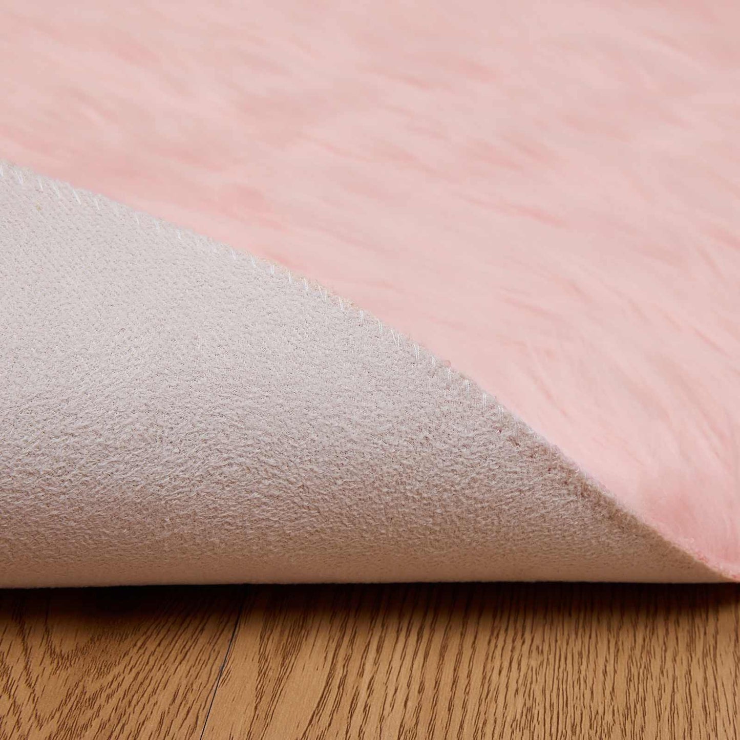 Fuskobbel lammeskindstæppe TAFALLA Lyserød Ø 80 cm Polyester