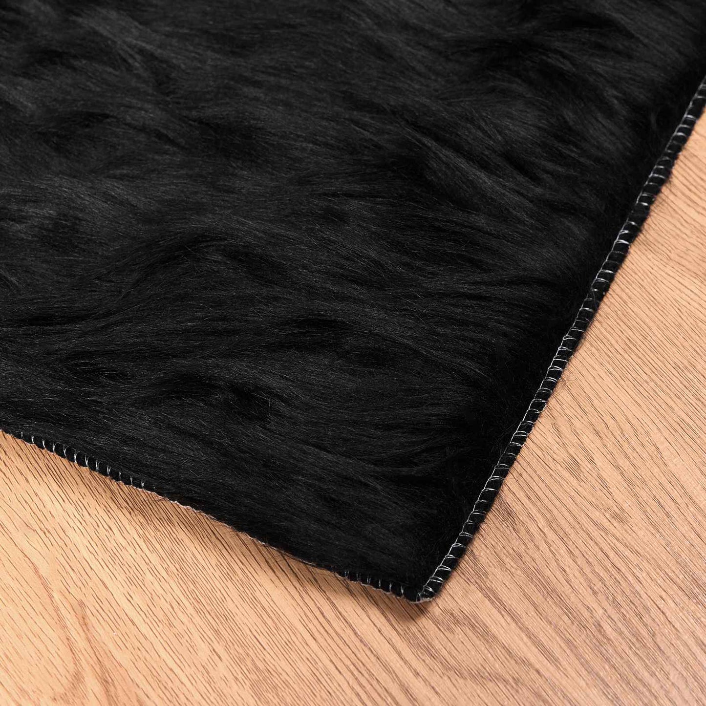 Fuskobbel lammeskindstæppe TAFALLA Sort 80 x 150 cm Polyester