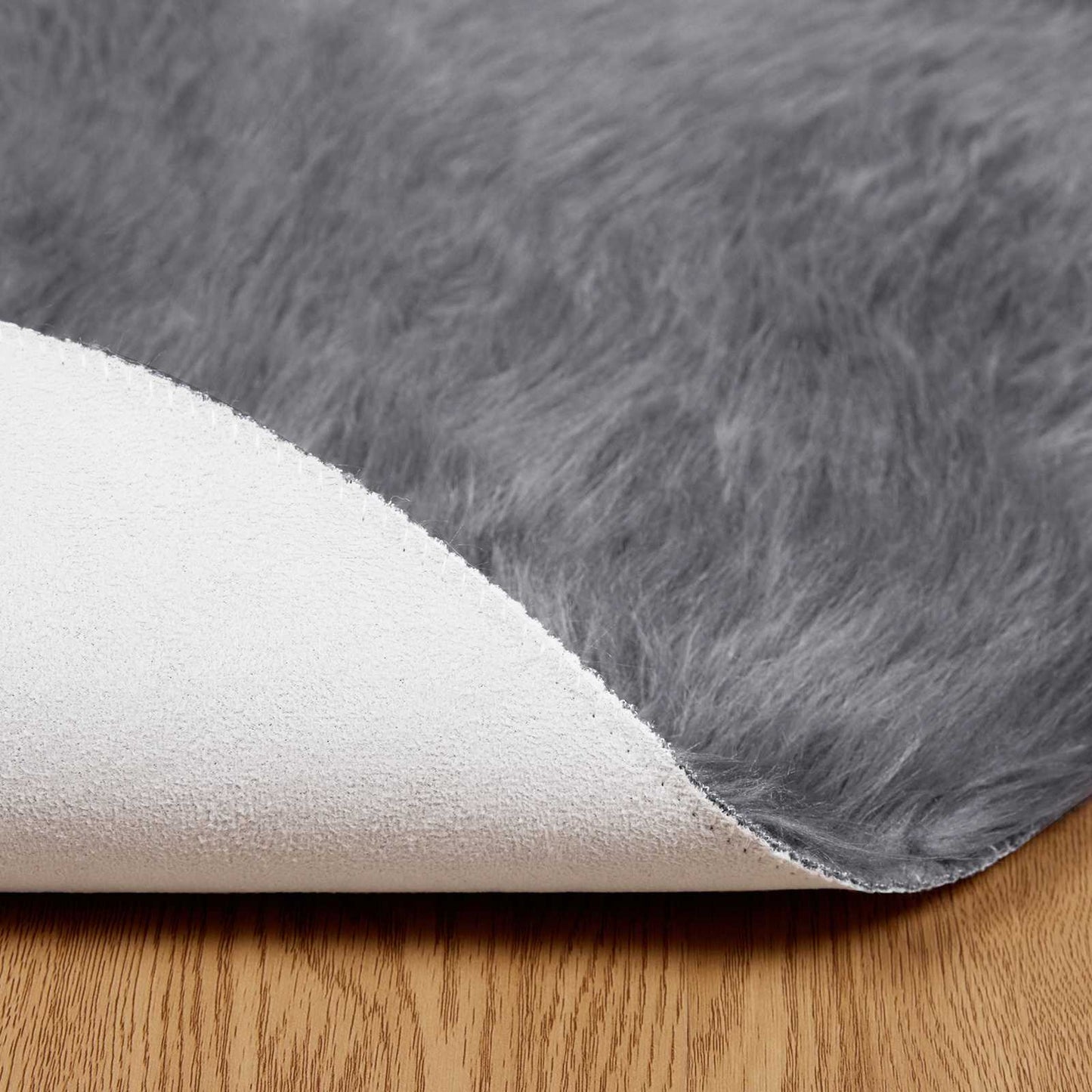 Fuskobbel lammeskindstæppe TAFALLA Antracit Ø 80 cm Polyester